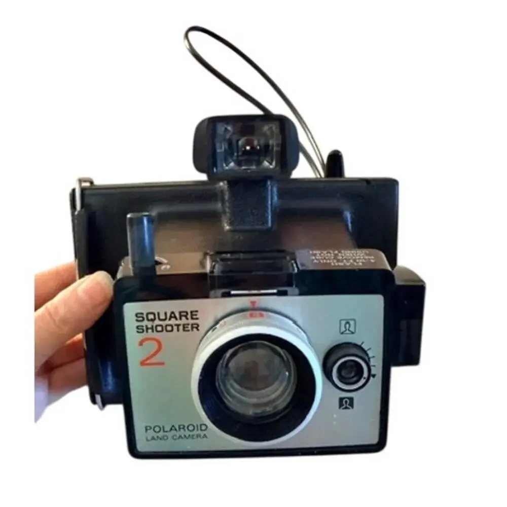 Vintage Polaroid Square Shooter 2 instant camera with Bauer E201 Ultrablitz